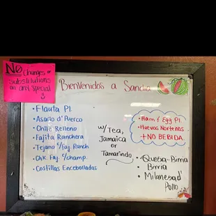 a menu on a white board