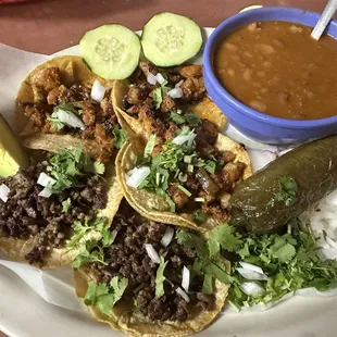 Mini tacos aka street tacos. 3 Pastor Taco and 2 Taco De Asada.