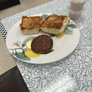 Toasted bun and sausage patty instead of the biscuits and gravy I ordered.