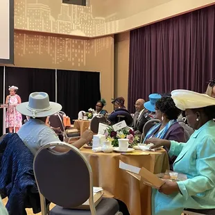 a group of people seated at a table