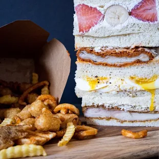 Hot chicken, curry chicken, egg salad, fruit sandwiches and fries