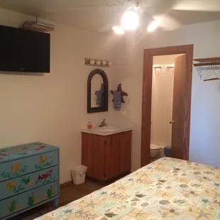 2nd bedroom other view. Sink is in the room bathroom is through the door.