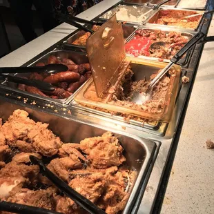 Fried chicken, sausage, white rice, mash potato, spaghetti, and more.