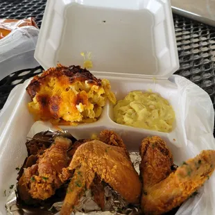 Chicken wings Mac n cheese and potato salad.