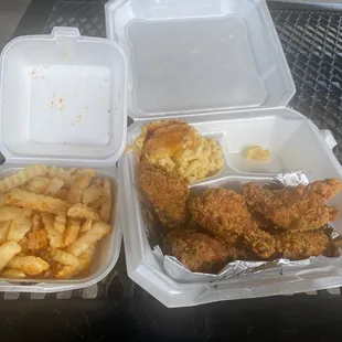 Fried chicken wings and fries