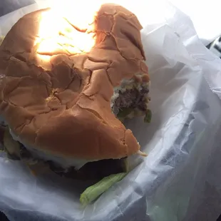 a hamburger in a wrapper