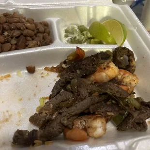 Beef&amp; shrimp fajitas?? I take it home but not going to eat it you see the  hole order it there??!