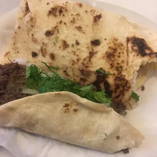 Barbacoa, cilantro, and onion.