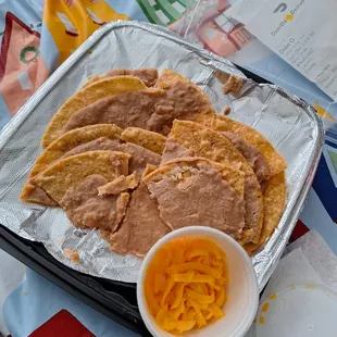 No 12 Chips w beans  ( gave me 9 ) No jalapeños,  no guacamole and NOT enough cheese for 9 chips anyway!! Never again will I order here.