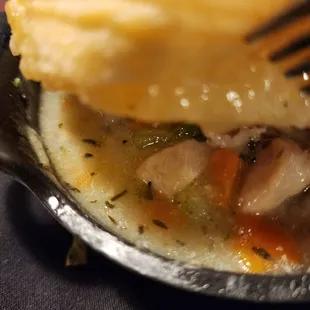 a plate of food with a fork