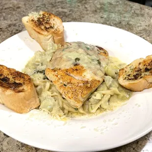 Blacken Snapper lemon artichoke sauce with capers over linguine- along with a side salad
