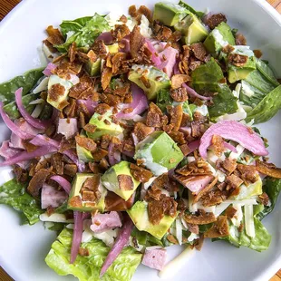 Cuban salad with toasted coconut, ham, avocado, pickled onion, and grapefruit-mustard vinaigrette.