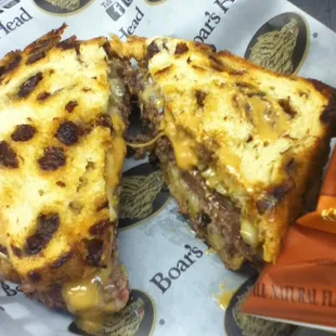 Cow Patty! It&apos;s a Patty Melt on grilled raisin bread and creamy peanut butter. Grilled to perfection.