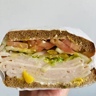 Turkey and Cheese on wheat bread--super packed with meat and fresh ingredients!