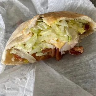 Turkey &amp; Cheese Rider with bacon, minus one bite.