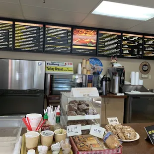 a counter with a variety of food items