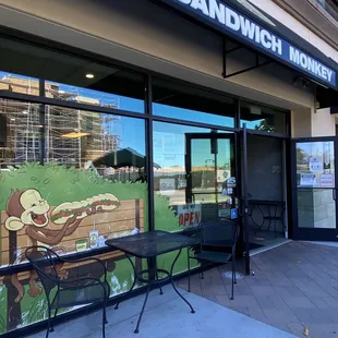 the outside of a sandwich shop