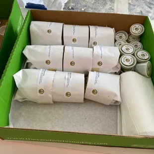 a box full of rolls of bread