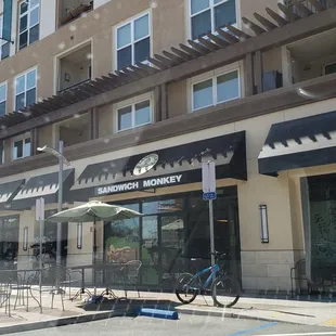 a bicycle parked in front of a restaurant