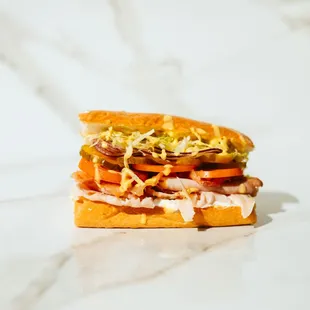 #7 Monkey Business
Turkey, Bacon &amp; Ham 
Our version of the classic Club Sandwich