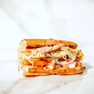 #1 King Louie -
Honey Ham, Breaded Chicken &amp; Swiss Cheese. Our version of the Cordon bleu