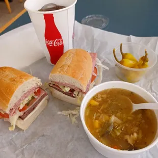 a bowl of soup and a sandwich