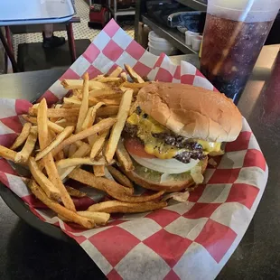 Deliciously greasy Double cheeseburger and fries.