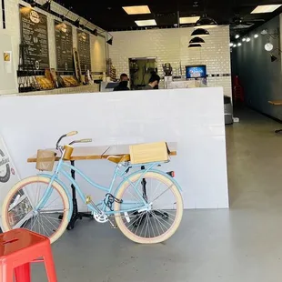 a bicycle parked in a cafe