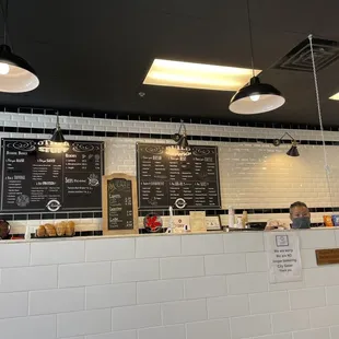 menus on the wall of a restaurant