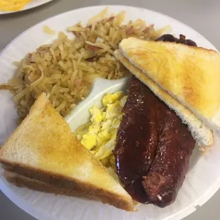 bacon, eggs, and hash browns on a paper plate