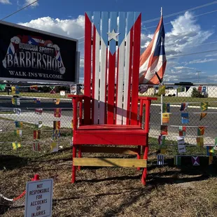 a chair made out of surfboards
