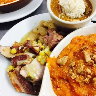 a plate of food with a bowl of soup