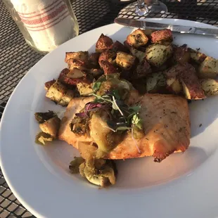 Salmon with apple compote and brussel sprouts and roasted red skin potatoes.