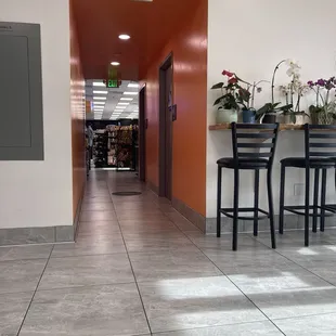 The convenient store  through the hall.