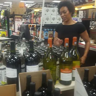 a woman in a liquor store
