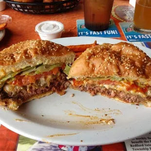 Black and Blue Burger - Cajun seasoned fresh ground round with crumbled bleu cheese and caramelized onions, served on a sesame bun