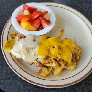 Aloha omelette with a fruit bowl