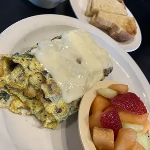Spinach&apos;s and double bacon omelette! Yummy! Cooked to perfection.