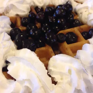 Blueberry waffle goodness! Fresh berries and the batter on this waffle had great flavor, nice and fluffy.