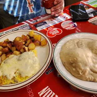 Senior bacon and mushroom omelet with potatoes and biscuits &amp; gravy