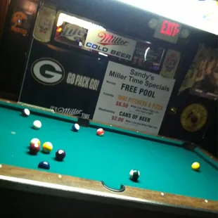 a pool table with balls on it