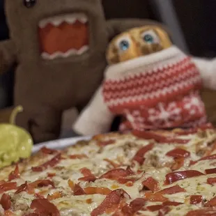 Pizza with sweet red peppers and stromboli topping! You MUST try this!