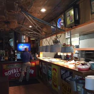 a man preparing food in a restaurant