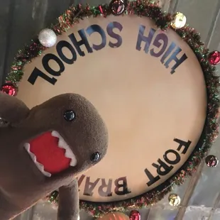 Vintage Fort Branch High School drum hanging from the ceiling all covered in tinsel and ornaments for the holidays!