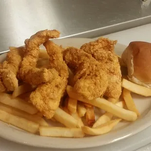 a plate of fried chicken and french fries