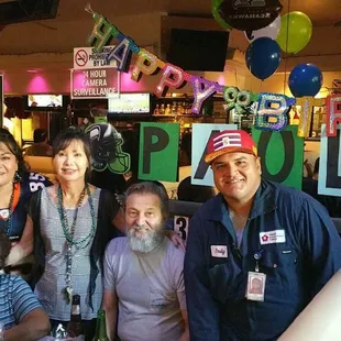 a group of people posing for a picture