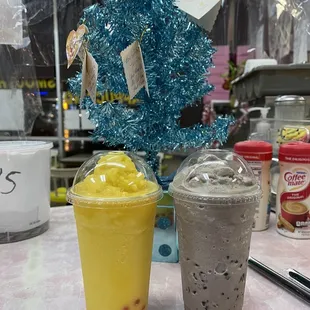 Passion fruit and cookies and cream smoothie with strawberry boba and coffee jellies from Sandy donuts !