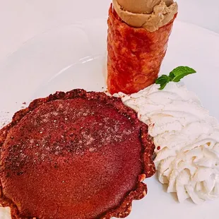 a plate of desserts with ice cream