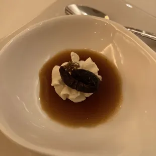 Amuse-bouche: saffron jelly with orange cream and olive