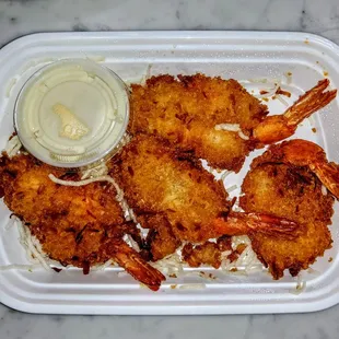 Crispy Coconut Shrimp (4) With fruit creamy sauce. $8